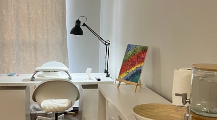 Cozy nail station at NailedbyNehita in Toronto, Ontario, CA, featuring bright decor and modern equipment.