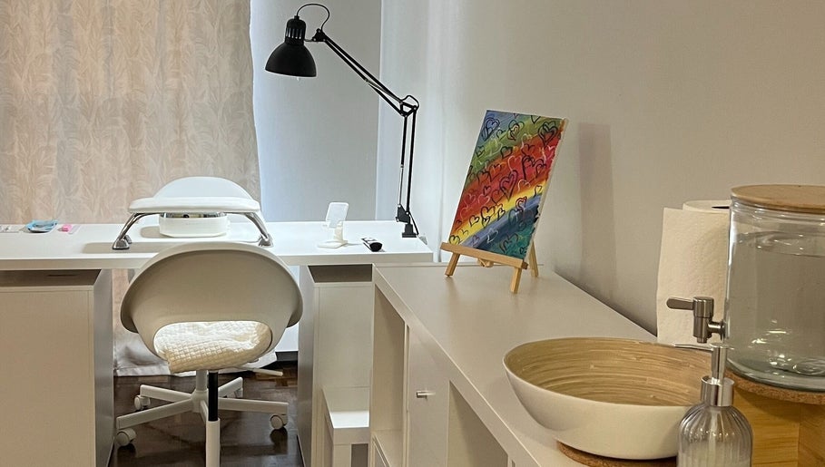 Elegant nail station at NailedbyNehita, Toronto, Ontario, CA with art and modern decor.