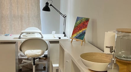 Elegant nail station at NailedbyNehita, Toronto, Ontario, CA with art and modern decor.