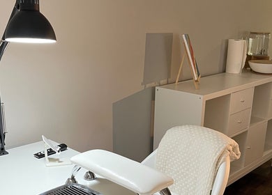 NailedbyNehita nail salon workspace in Toronto, Ontario, CA, showcasing a stylish manicure desk and modern lighting.