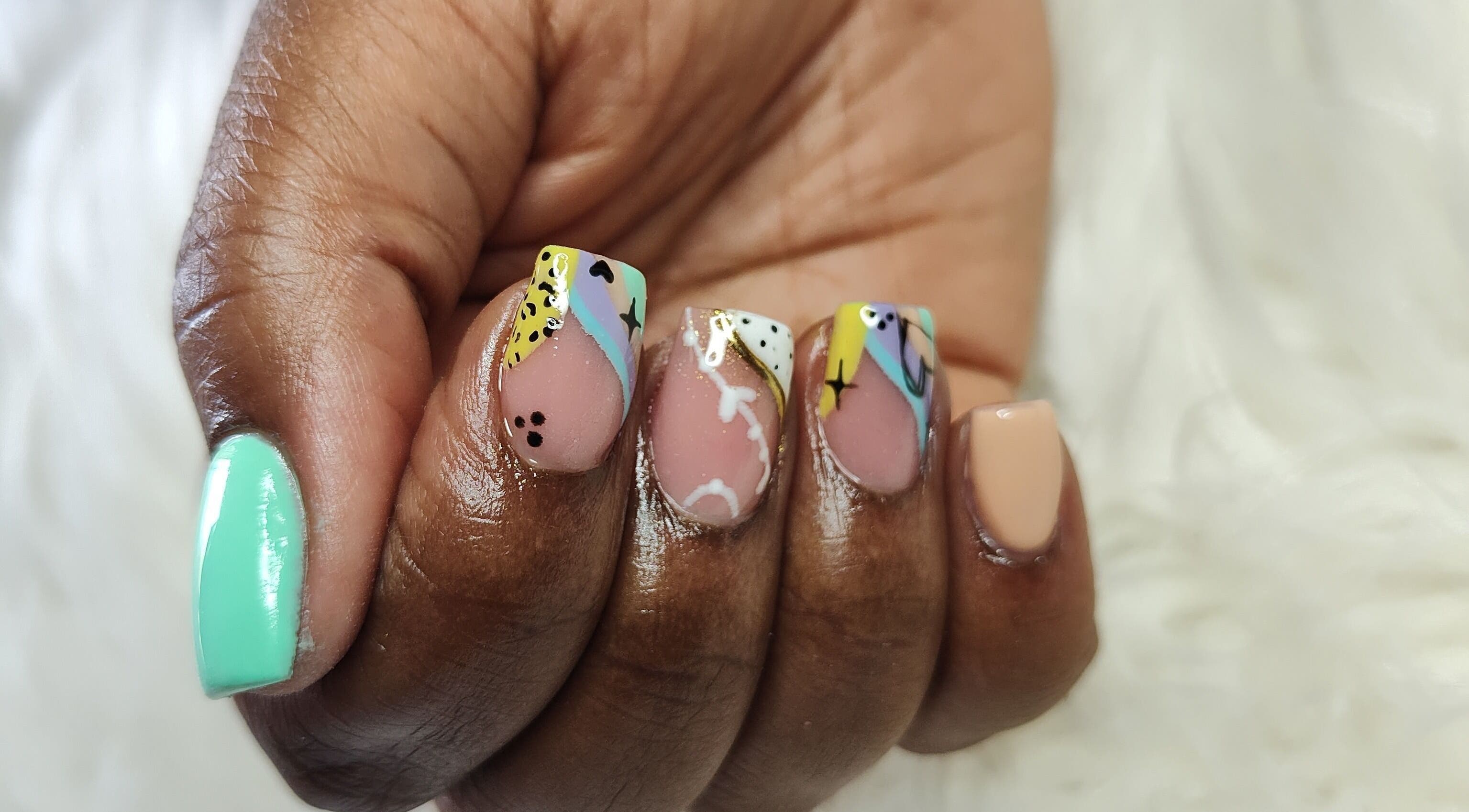 Colorful artistic nail design at Perfect Polish, Lusaka, Lusaka Province, ZM.
