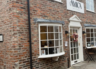 Charming brick facade of Bare and Glow Skin in Thirsk, England, GB, showcasing its inviting entrance.