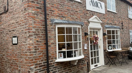 Charming brick facade of Bare and Glow Skin in Thirsk, England, GB, showcasing its inviting entrance.