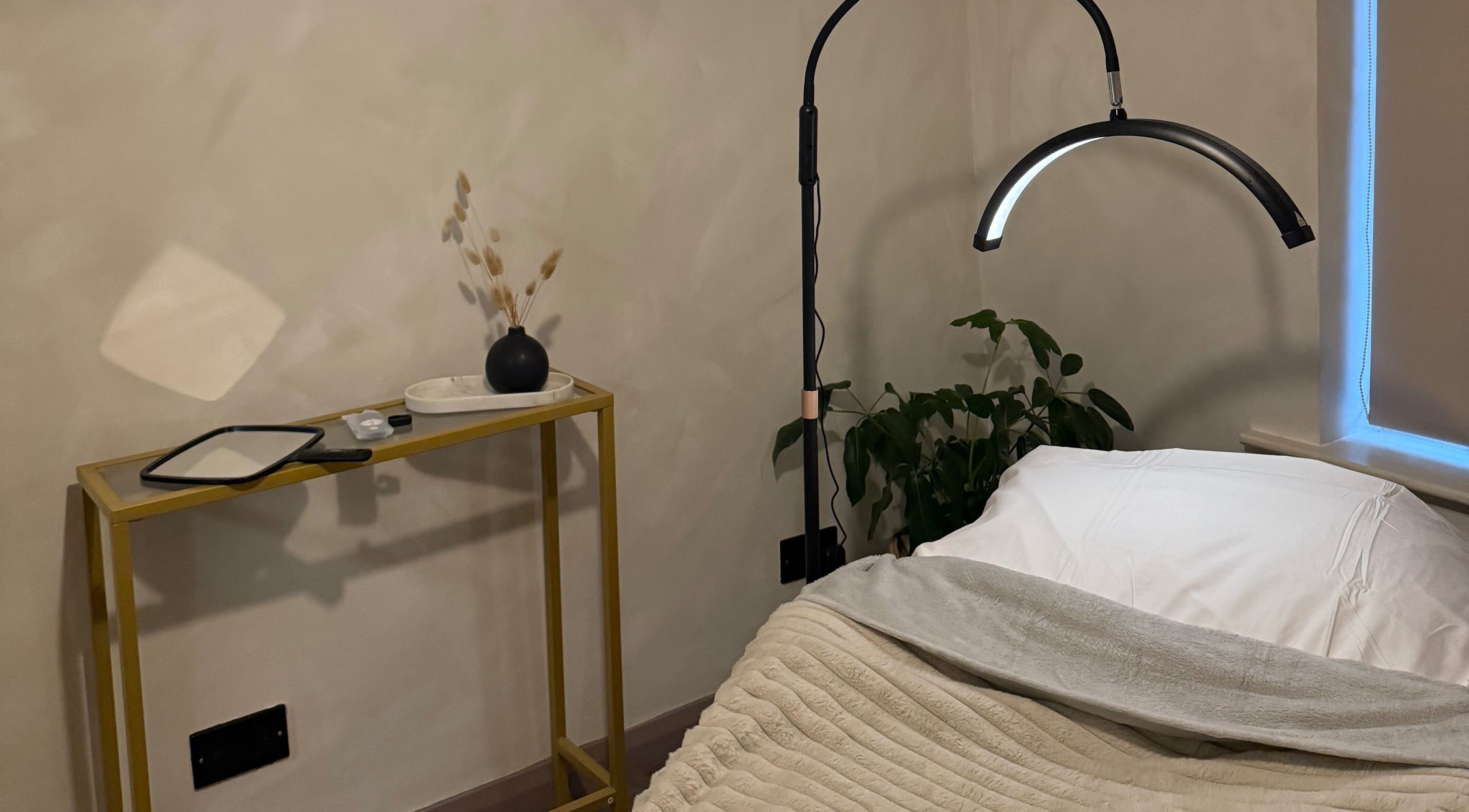 Cozy treatment room at Bare and Glow Skin, Ripon, England, GB, featuring a serene setup with lighting and decor.