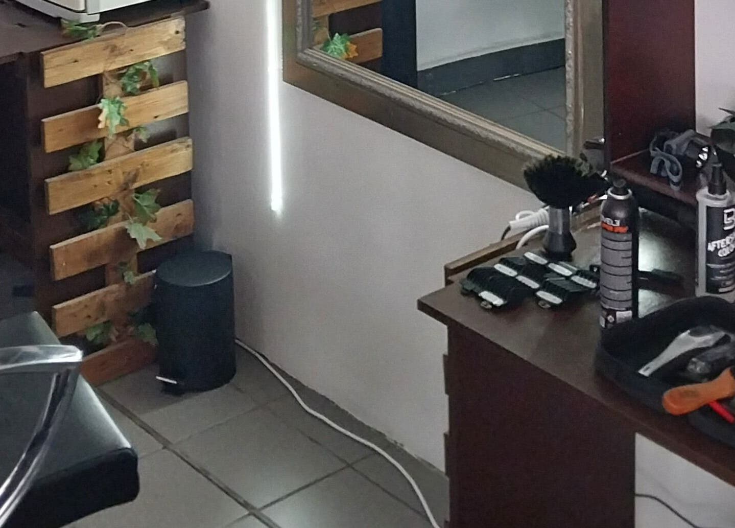 Cozy corner of Blendculture salon in Windhoek, Khomas Region, NA, featuring hair styling tools and natural decor.