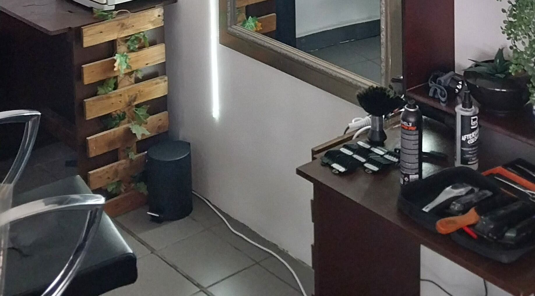 Cozy corner of Blendculture salon in Windhoek, Khomas Region, NA, featuring hair styling tools and natural decor.