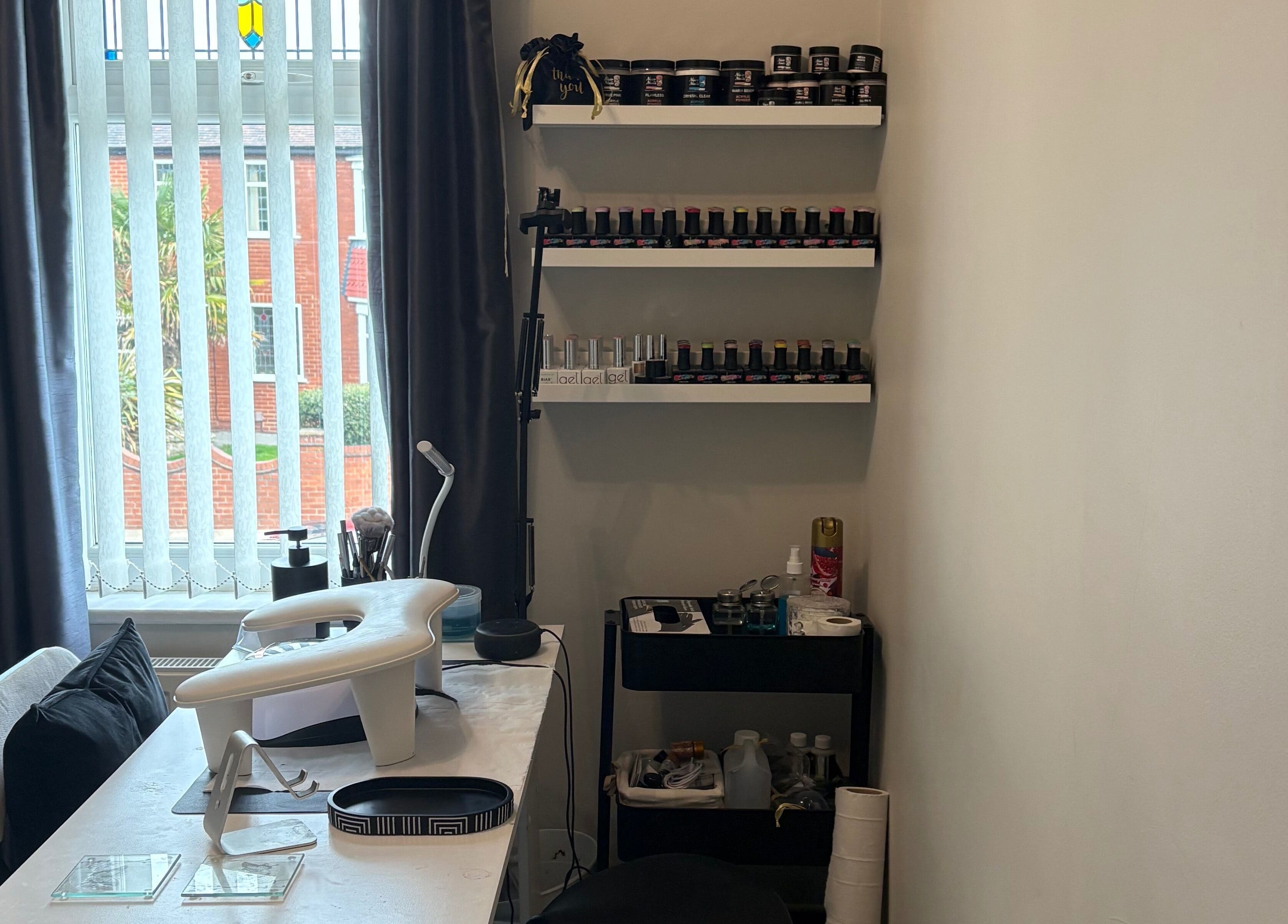 EDM Beauty nail studio in Stockton-on-tees, England, GB featuring stylish shelves and tools.