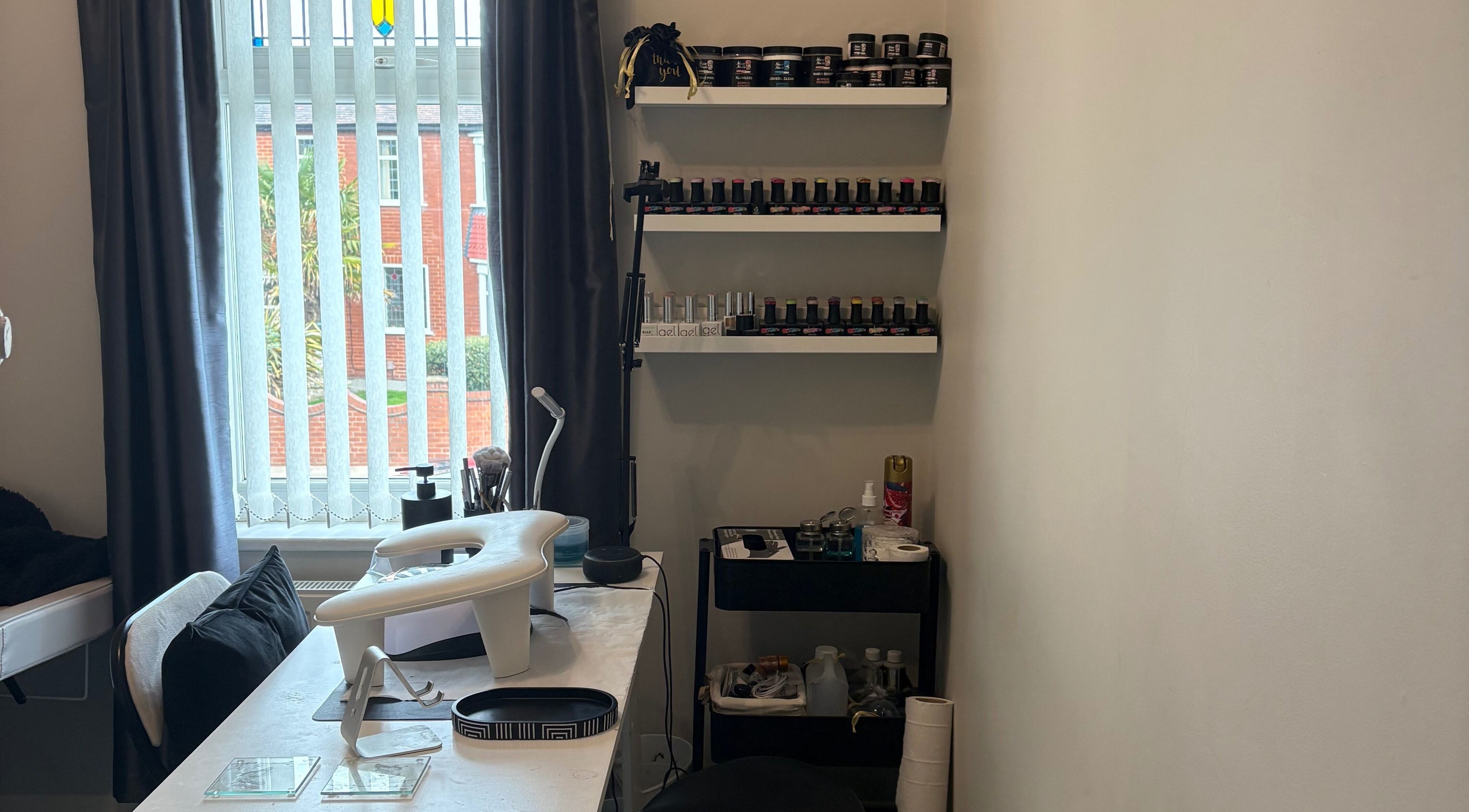 EDM Beauty nail studio in Stockton-on-tees, England, GB featuring stylish shelves and tools.