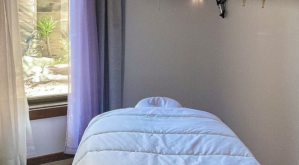 Calming massage room at Therapeutic Touch, Sonoma, California, US. Soft lighting and serene vibes.