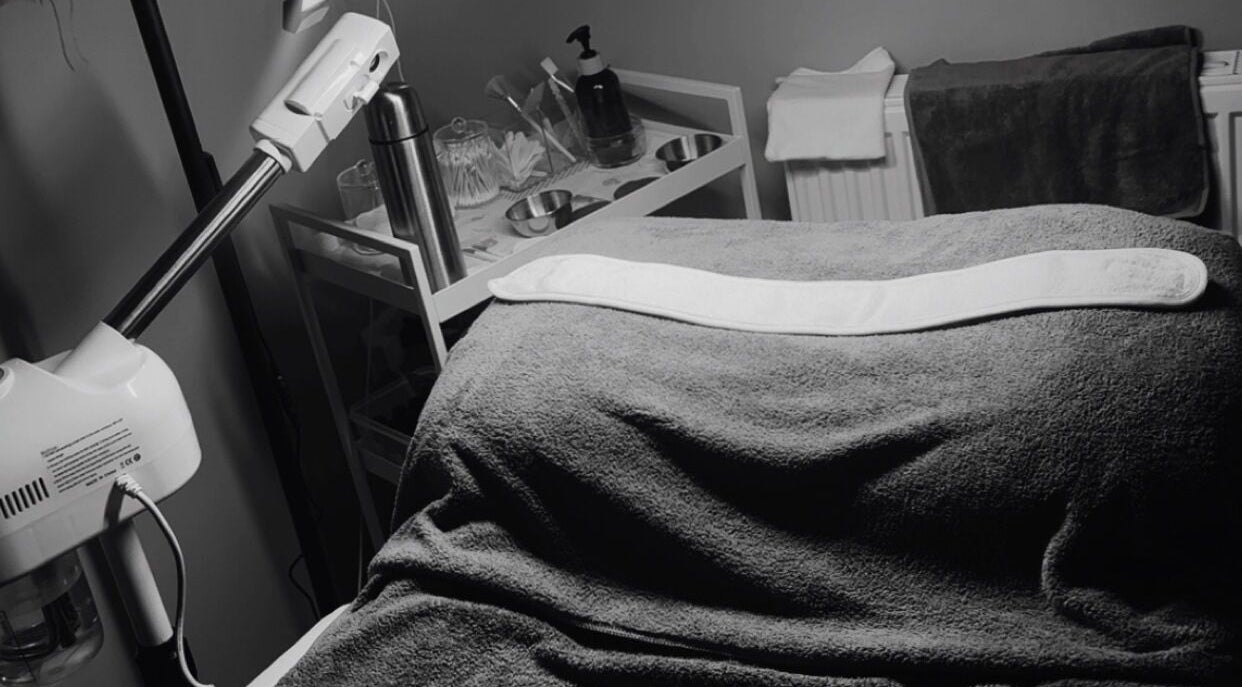 Cozy massage table setup at Serenique Massage Clinic, Clayton West, England, GB, offering a tranquil escape.