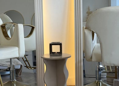 Luxurious chairs at The Beauté Lounge Newcastle, Newcastle upon Tyne, England, GB enhance the salon experience.