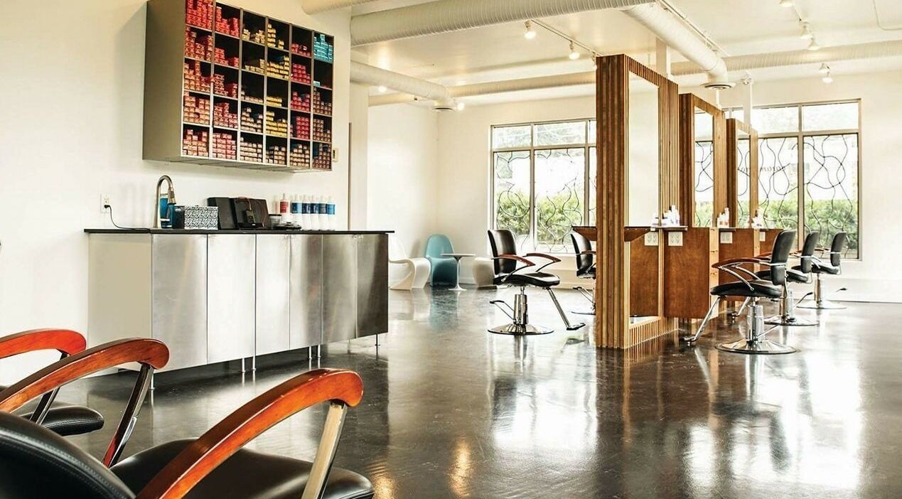 Modern styling chairs at Space Salon | South Surrey, Surrey, British Columbia, CA highlighted by natural light.