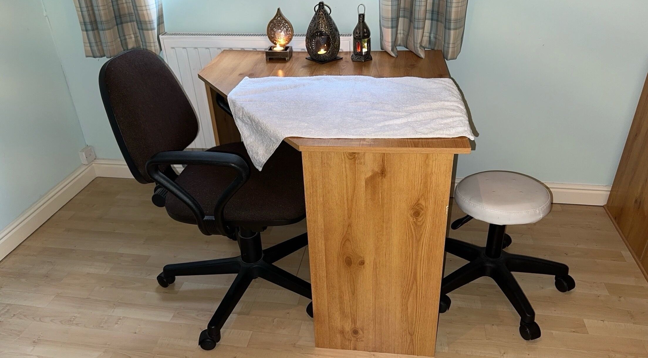 Cozy beauty desk at TAKE TIME FOR YOU, -, England, GB with chair and lantern decor.
