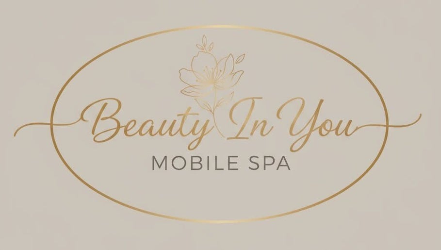 Logo of Beauty IN You Mobile Spa in Columbia, US, featuring elegant floral design.