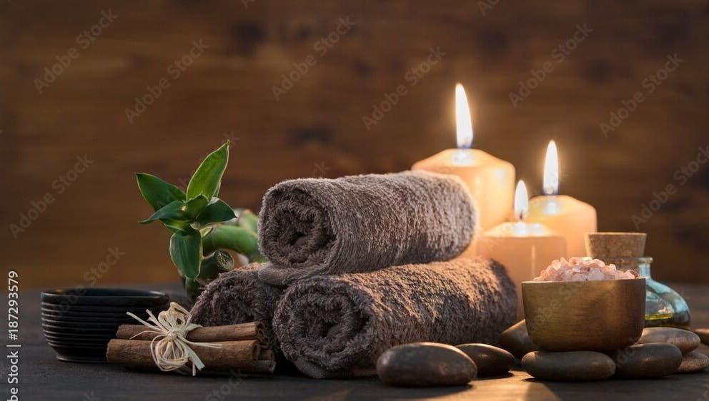 Serene spa setup with candles, towels, and salts at Apex Retreat, Algiers, Algiers Province, DZ.