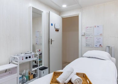 Tranquil treatment room at Lalice Spa & Beauty, London, England, GB featuring plush linens and calming decor.