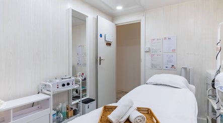Tranquil treatment room at Lalice Spa & Beauty, London, England, GB featuring plush linens and calming decor.