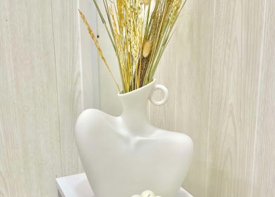 Elegant white vase with dried flowers at Lalice Spa & Beauty, London, England, GB.