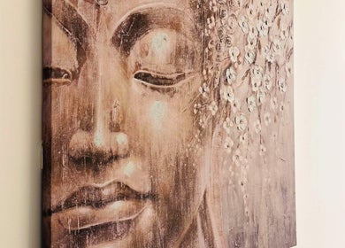 Tranquil Buddha painting in Lalice Spa & Beauty, London, England, GB, symbolizing peace and relaxation.