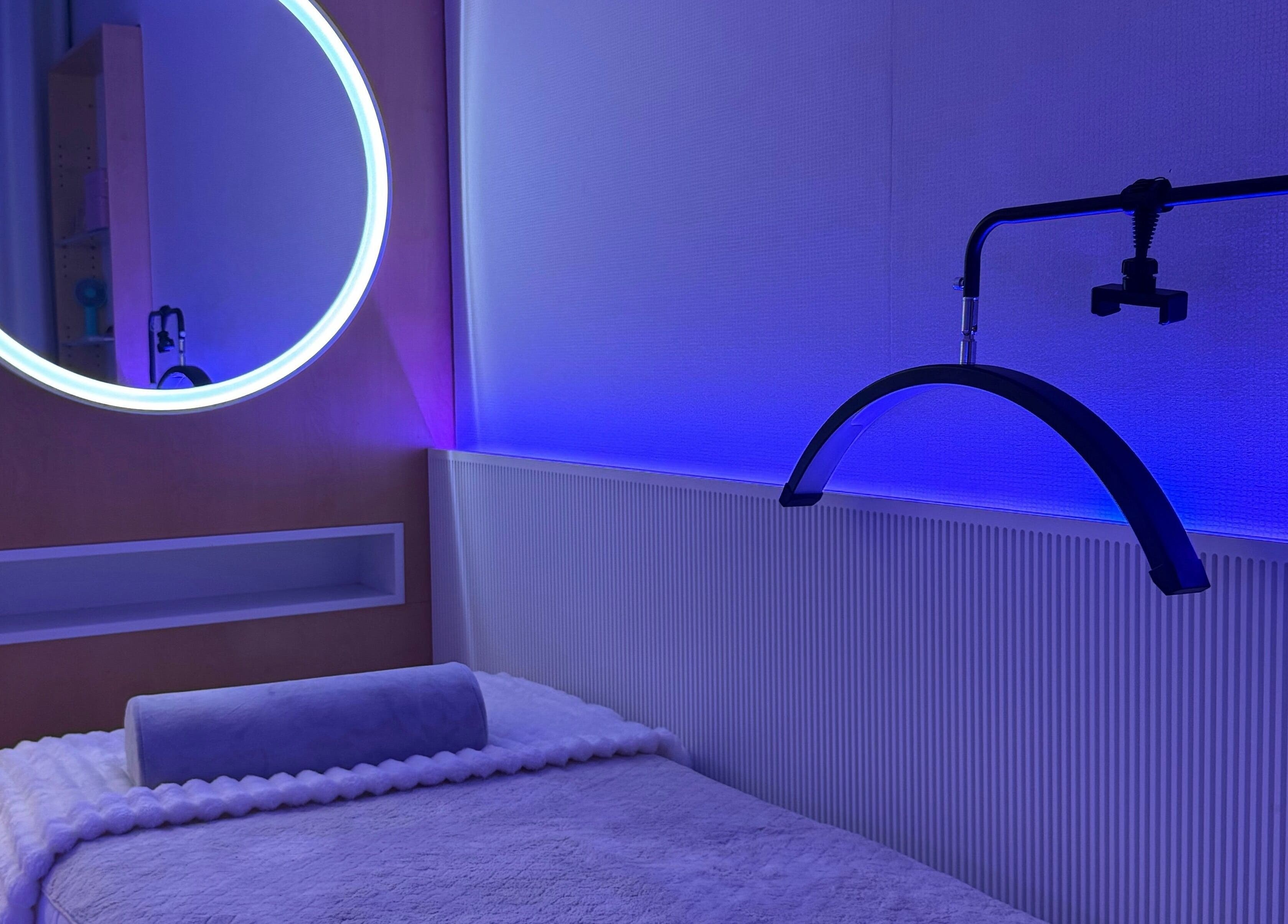 Tranquil treatment room with ambient lighting at Bondi Beauty Studio, Bondi Junction, New South Wales, AU.