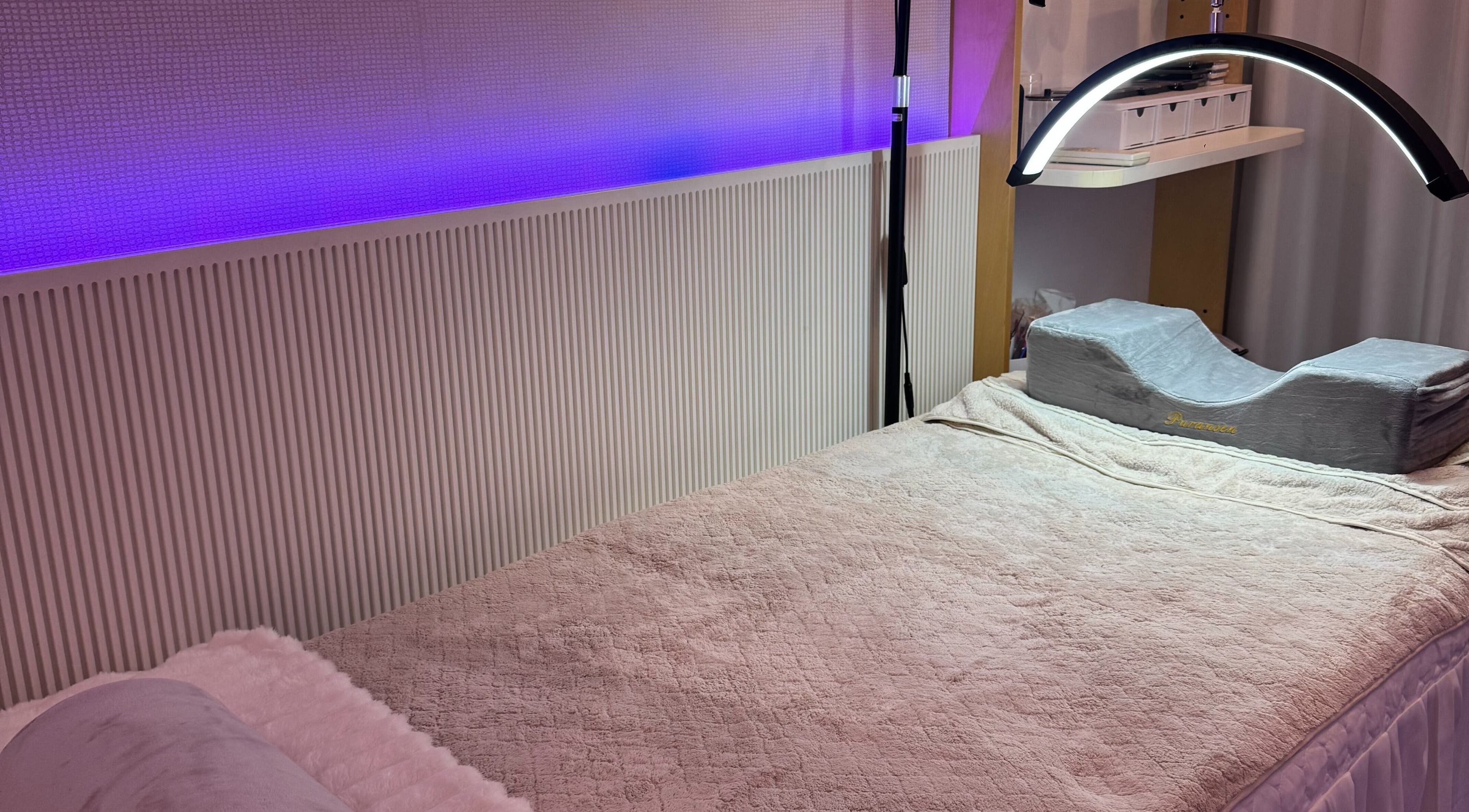 Relaxing treatment room at Bondi Beauty Studio, Bondi Junction, New South Wales, AU with soft lighting.