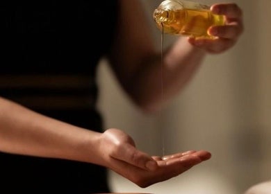 Aroma oil being poured at Novaé by Valentina, located in Newstead, Queensland, AU.