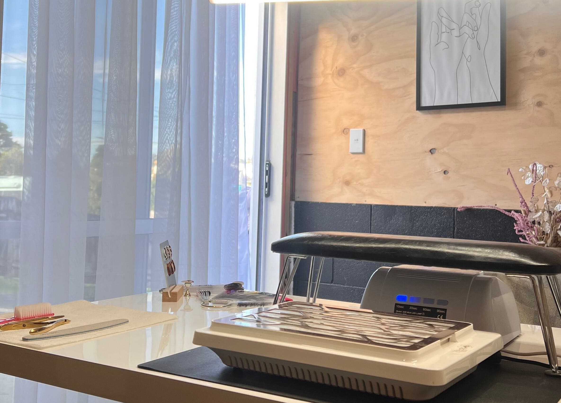 Cozy nail station at Studio L Nails in New Plymouth, Taranaki Region, NZ with tools and decor.