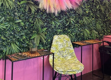 Vibrant foliage wall and leopard chair at Dream Hair&Beauty by Rachel, Spilsby, England, GB.