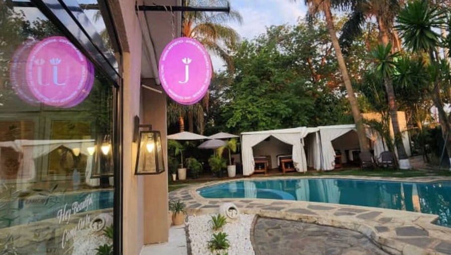 Juvenex Beauty Services - Katima Branch's tranquil poolside area in Lusaka, Lusaka Province, ZM.