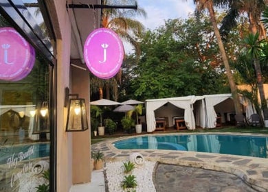 Juvenex Beauty Services - Katima Branch's tranquil poolside area in Lusaka, Lusaka Province, ZM.
