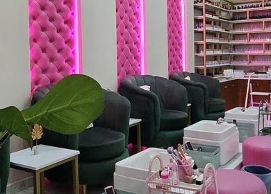 Luxurious pink and black seating area at Juvenex Beauty Services - Makeni Branch, Lusaka, Lusaka Province, ZM.