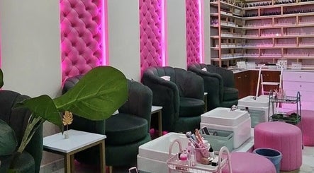 Luxurious pink and black seating area at Juvenex Beauty Services - Makeni Branch, Lusaka, Lusaka Province, ZM.