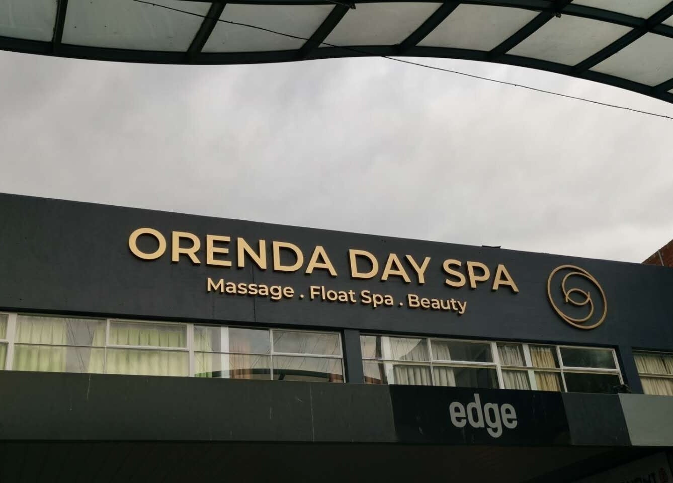 Front view of Orenda Day Spa entrance in Hobart, Tasmania, AU showcasing signage for massage, float spa, beauty.