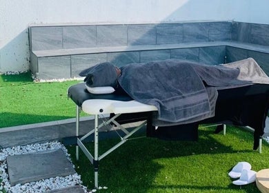 Outdoor massage setup at Semeni Asante Spa in Johannesburg, Gauteng, ZA, offering serene relaxation.