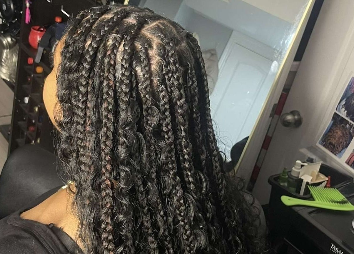 Intricate braids styled at Hair By Nhia, Brampton, Ontario, CA showcasing expert hair craftsmanship.