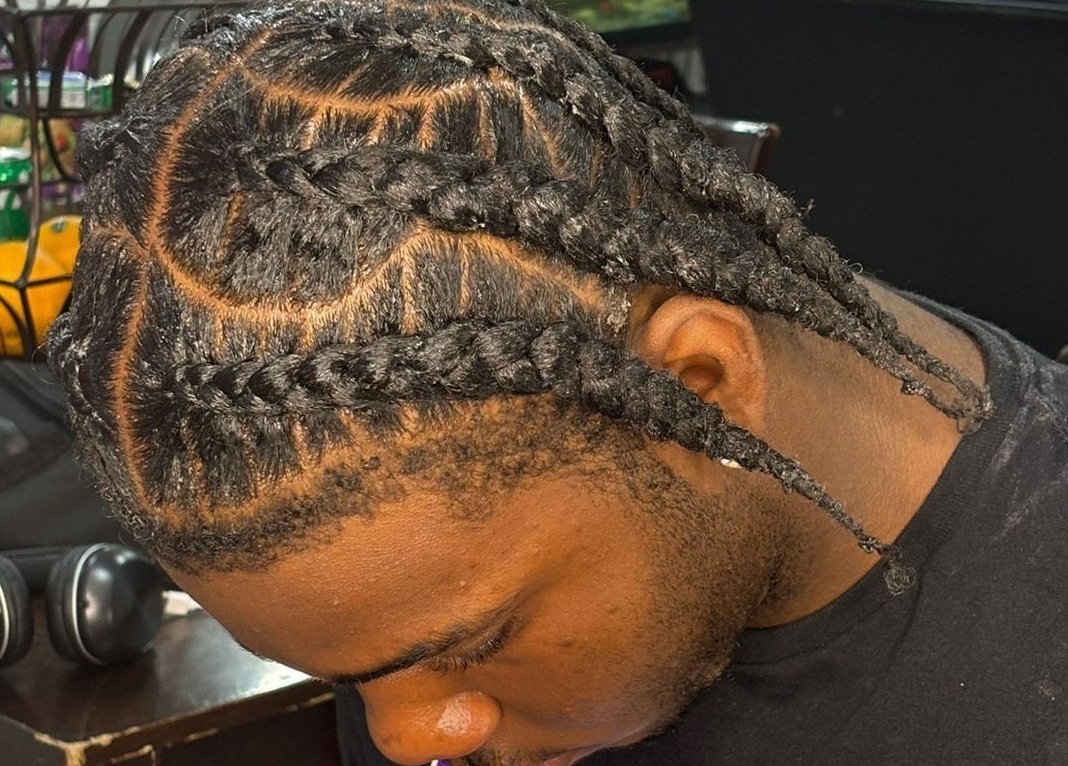 Intricate braided hairstyle at Hair By Nhia in Brampton, Ontario, CA, showcasing detailed craftsmanship.
