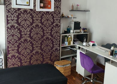Chic beauty setup at LM Touch, Horley, England, GB featuring a purple chair and elegant decor.