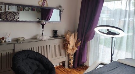 Cozy therapy room at LM Touch in Horley, England, GB with elegant decor and ambient lighting.