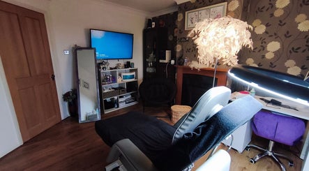 LM Touch beauty room in Horley, England, GB, featuring cozy decor and ambient lighting.