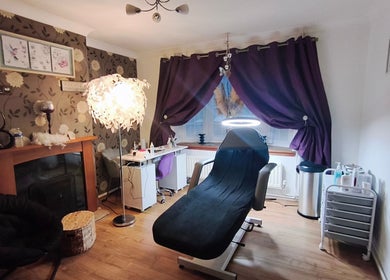 LM Touch wellness room with chair and decor in Horley, England, GB, enhancing relaxation and comfort.