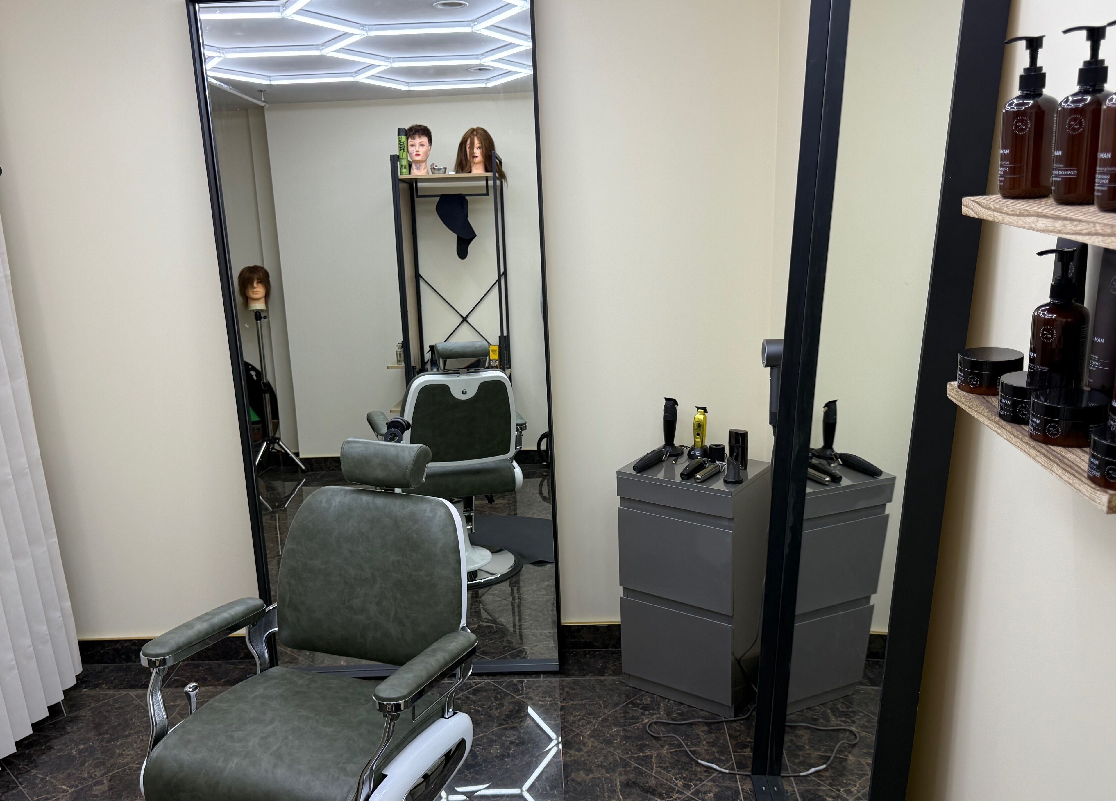 Modern salon chair and products at Park And Cut, Auckland, Auckland, NZ.