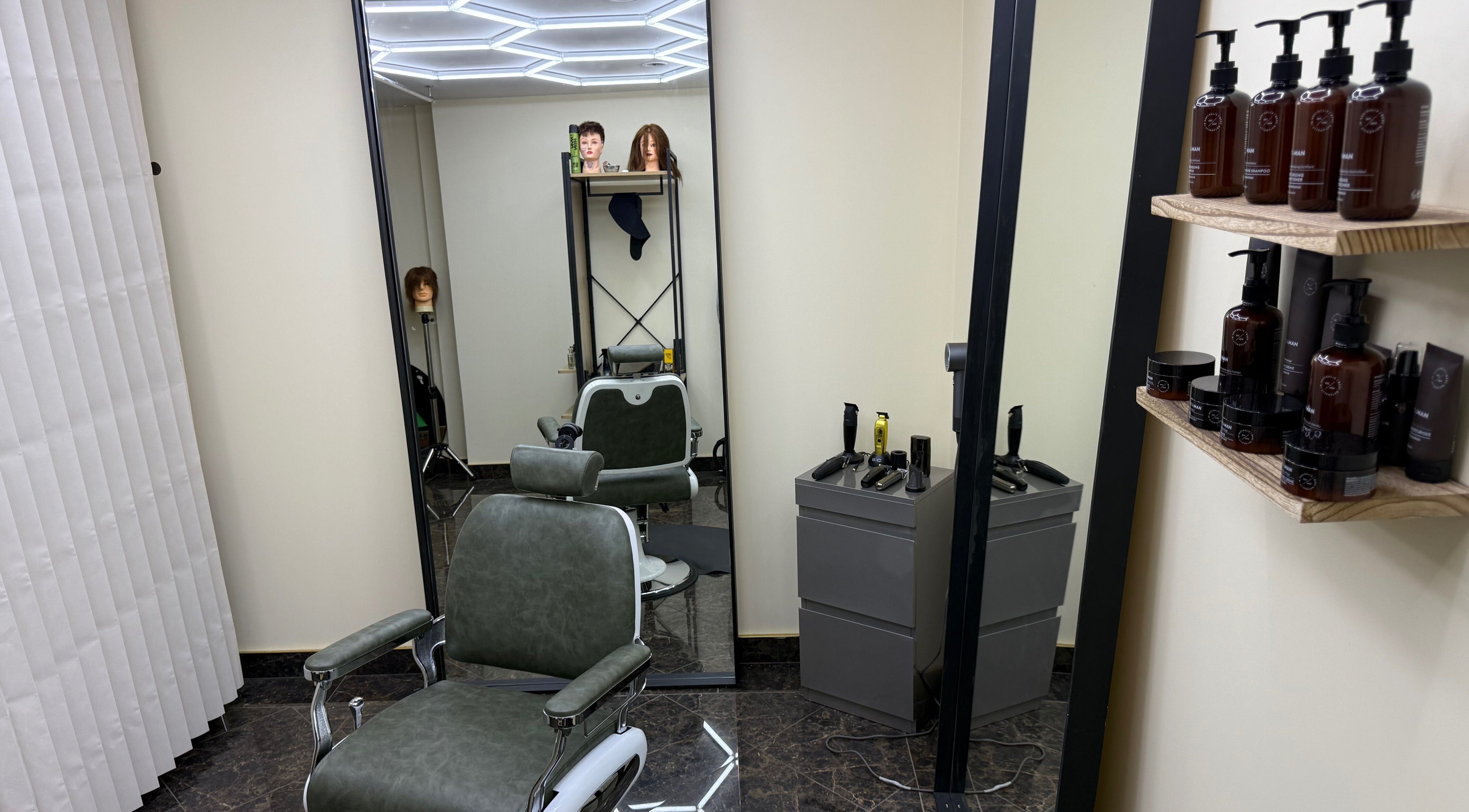 Modern salon chair and products at Park And Cut, Auckland, Auckland, NZ.