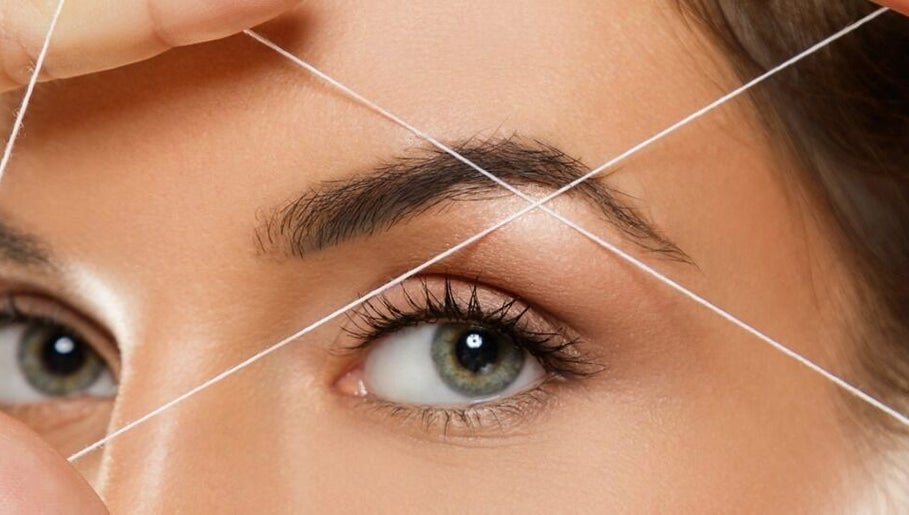 Eyebrow threading at Royal Beauty Parlour, Berserker, Queensland, AU, showcasing precision and care.