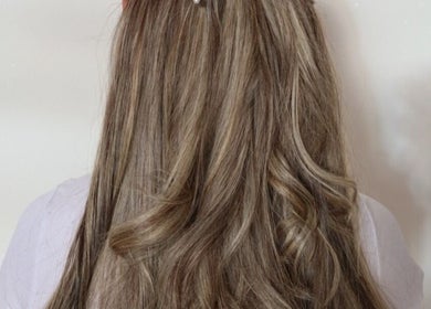 Beautiful curled hairstyle at Royal Beauty Parlour, Berserker, Queensland, AU offering top hair styling.
