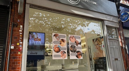 Exterior of Dalya Cosmo clinic in London, England, GB showcasing stylish signage and window displays.