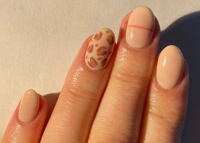 Elegant nude nails with leopard pattern at Nails By Valente, Tranent, Scotland, GB.