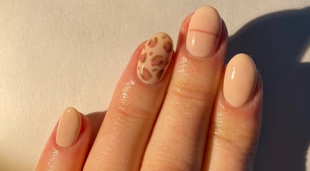 Elegant nude nails with leopard pattern at Nails By Valente, Tranent, Scotland, GB.