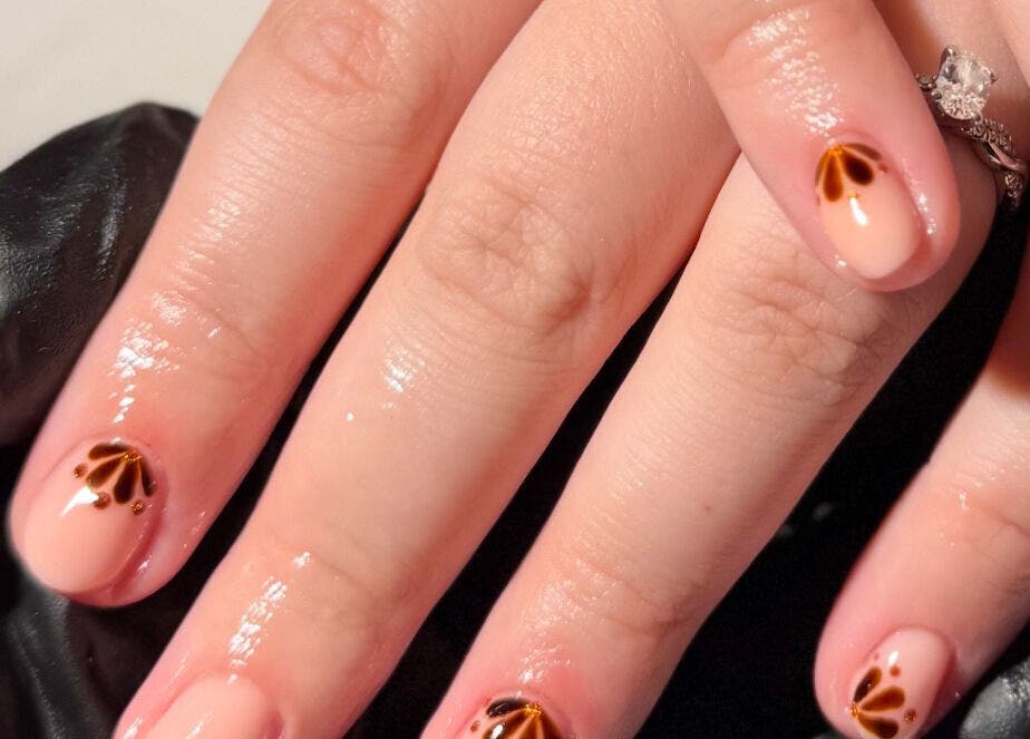 Elegant nail art with brown patterns at Nails By Valente, Tranent, Scotland, GB.
