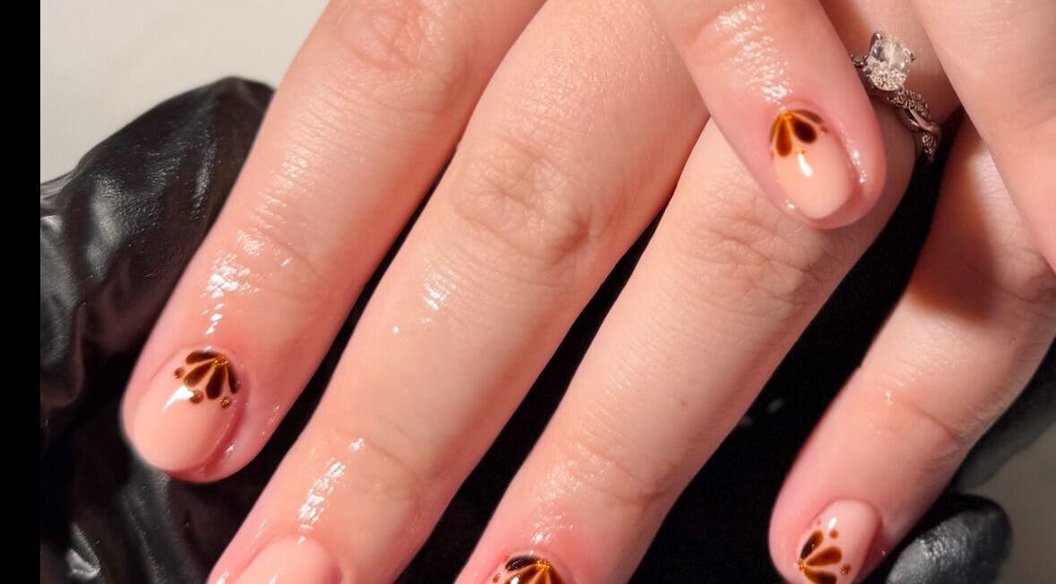 Elegant nail art with brown patterns at Nails By Valente, Tranent, Scotland, GB.