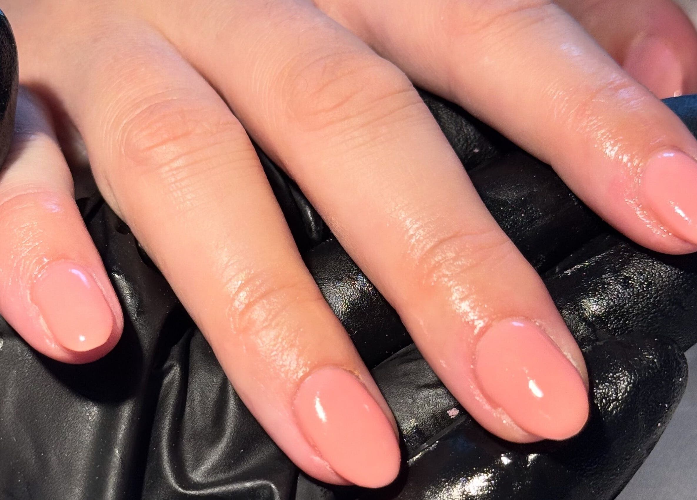 Polished pink nails at Nails By Valente, Tranent, Scotland, GB, showcasing expert manicure skills.